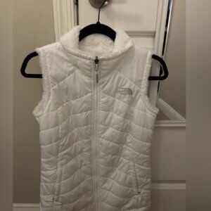 The North Face 
White reversible puffer vest
